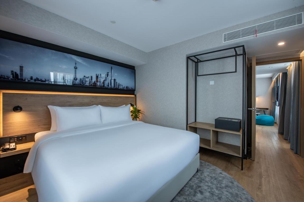 Park Inn By Radisson Shanghai Huanqiugang Eksteriør billede