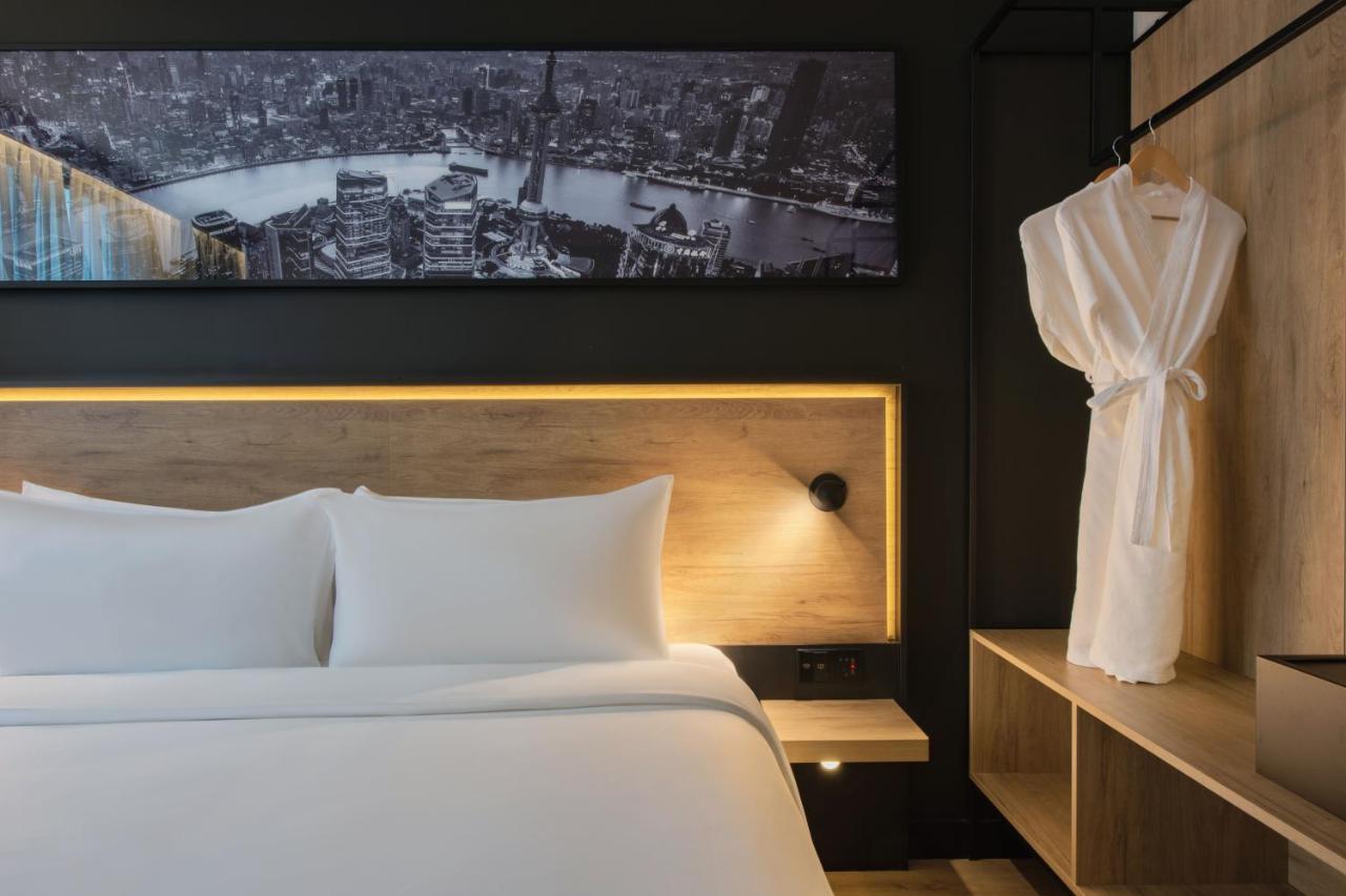 Park Inn By Radisson Shanghai Huanqiugang Eksteriør billede