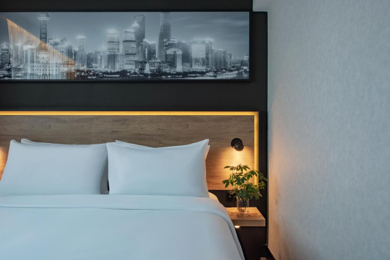 Park Inn By Radisson Shanghai Huanqiugang Eksteriør billede